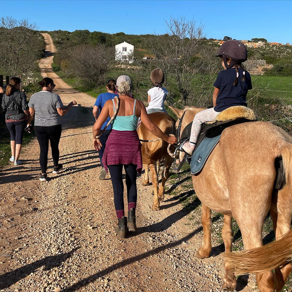 We love our kids and they love us and the horses